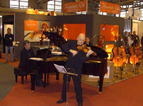 Adriaan Stoet (violin) and Tjako van Schie (pianist) playing on the Frankfurt Musikmesse 2008 at the stand of Heinrich Gill
